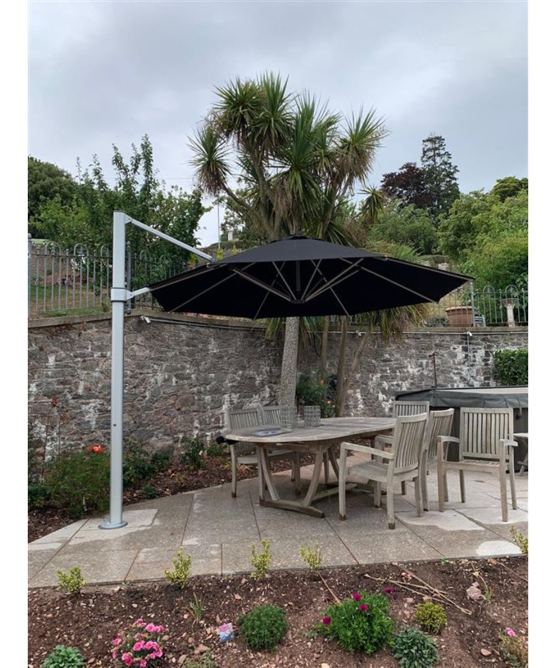 black aurora parasol open in garden uk