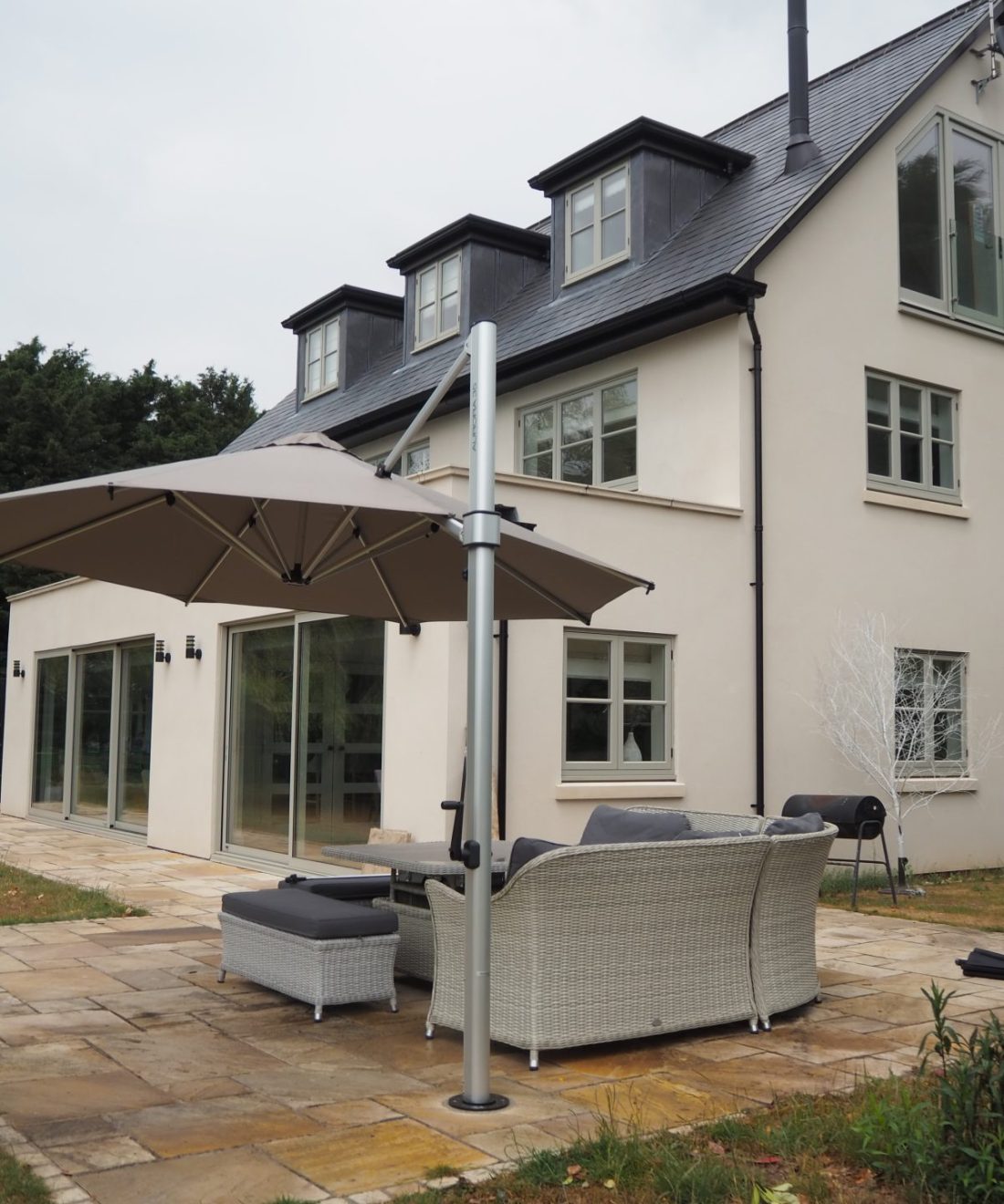 Aurora outside residential house with furniture